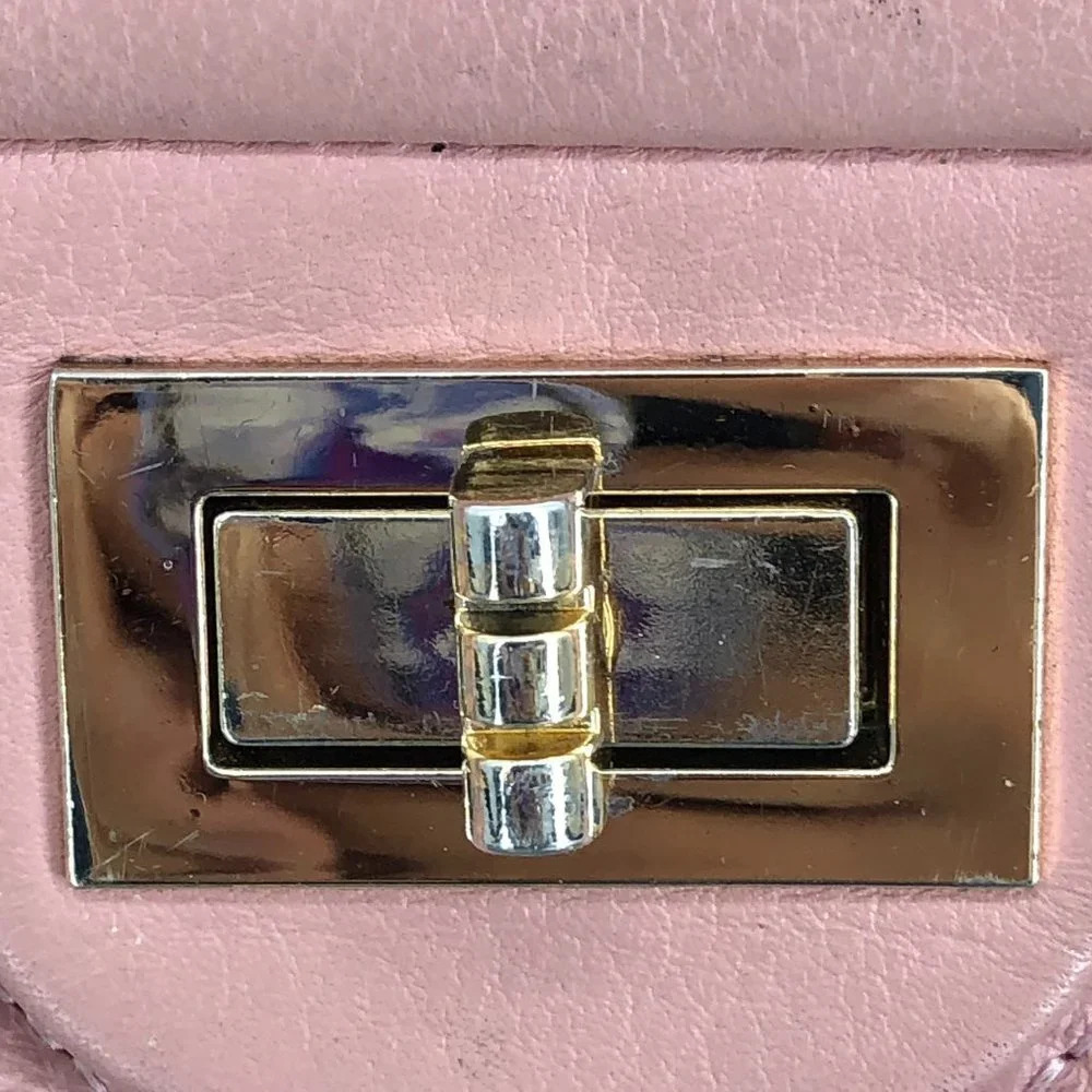 Baby pink quilted purse with chain strap and gold-toned hardware - Picture 3 of 15